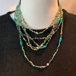 Beaded multi tiered necklace